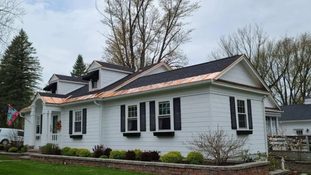 Roof repair in progress on a Utica NY home by Cobblestone Construction